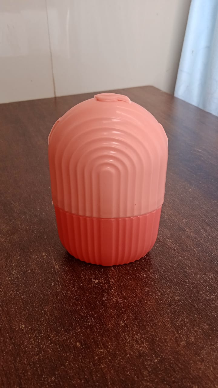 The reusable ice face roller displayed from another angle, ready for skincare application.