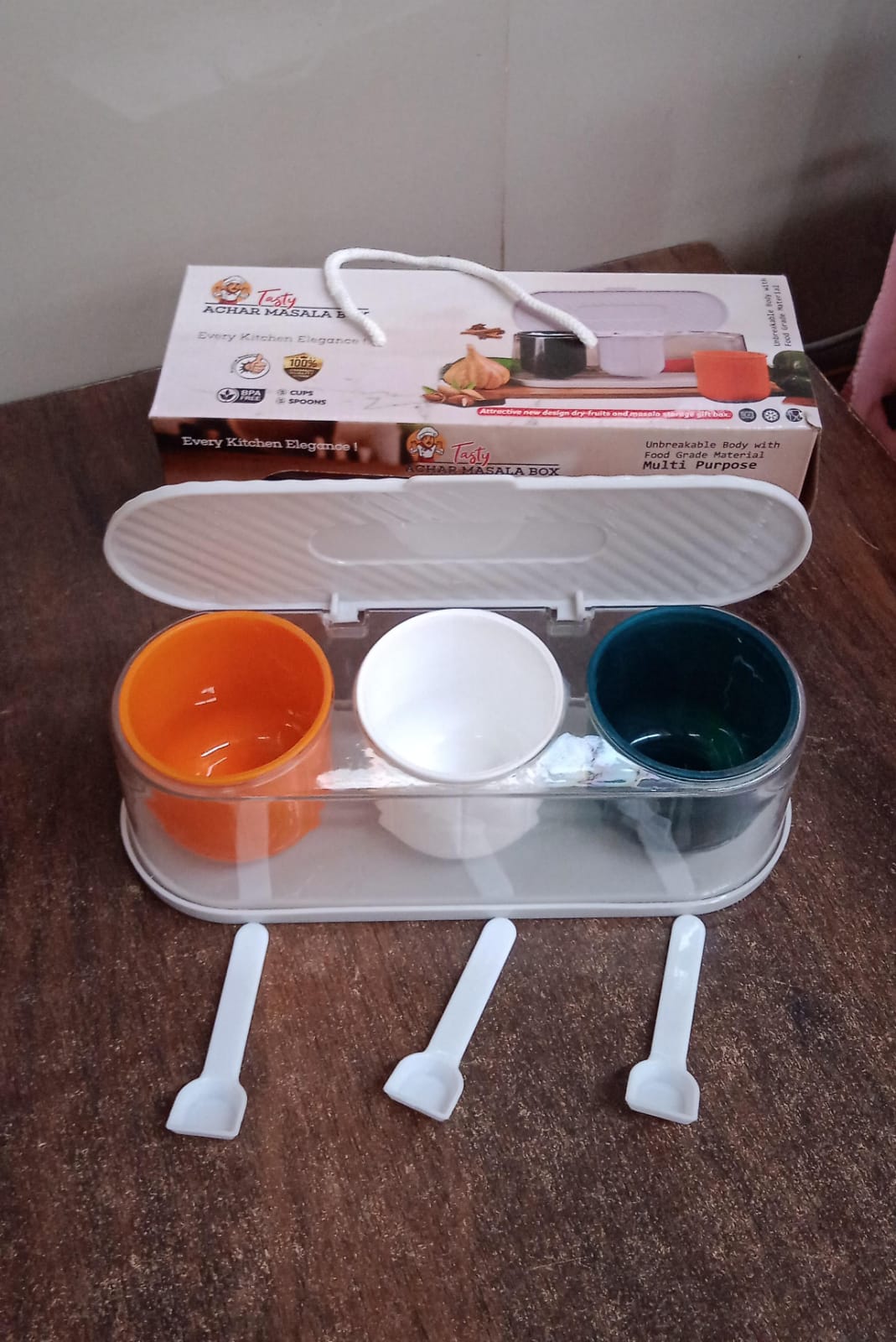 Lifestyle shot featuring the multicolor spice box elegantly displayed in a contemporary kitchen setting.