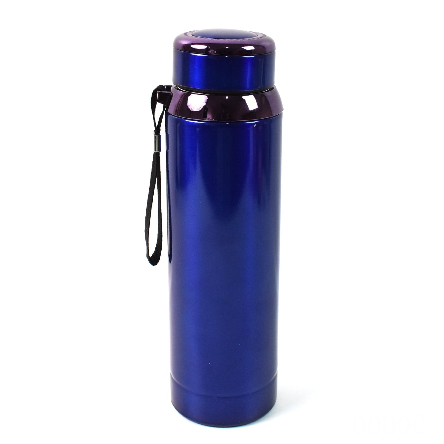 Stainless steel water bottle on table with drink inside