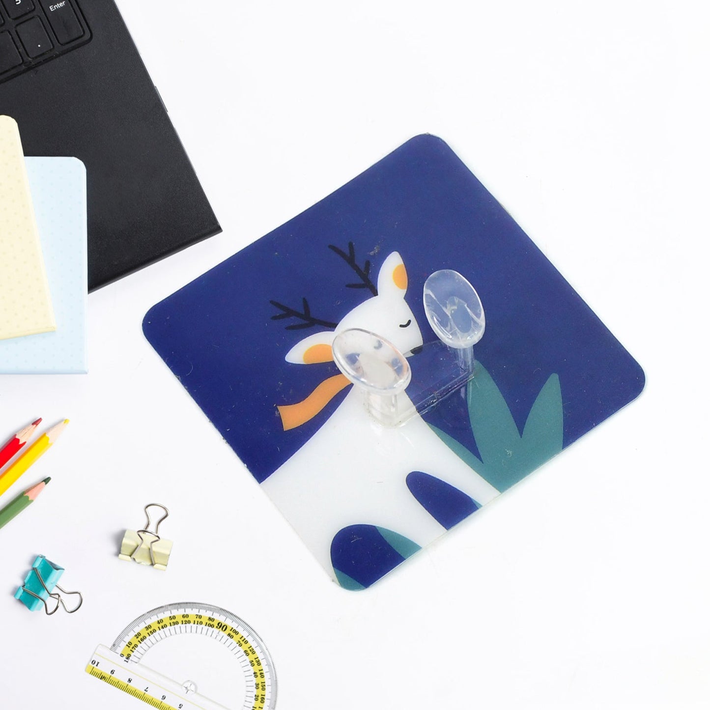 Waterproof self-adhesive wall hook with smooth edges mounted on a clean wall.