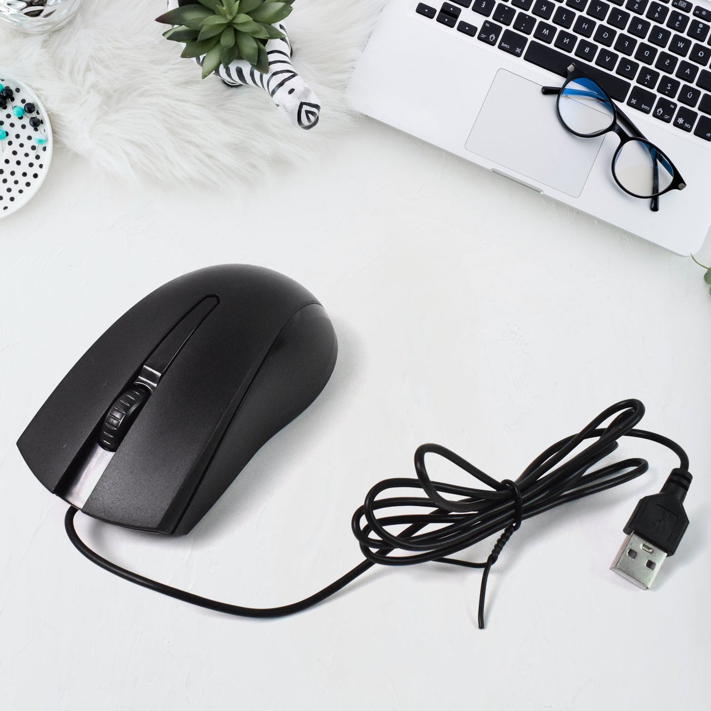 Compshop X2 Wired Optical Mouse with its sleek design on a clean white background.