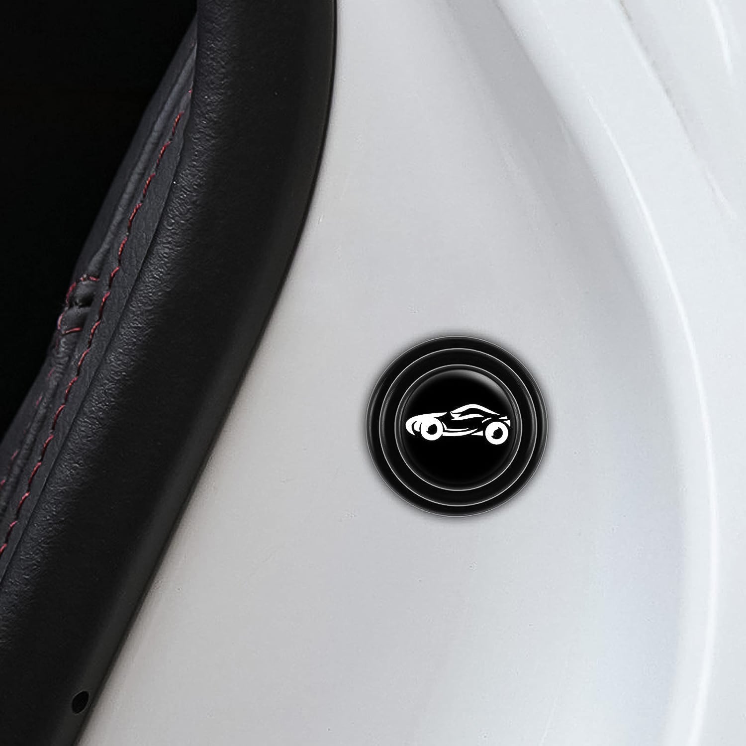 Close-up of the flexible car door protector sticker on a vehicle.