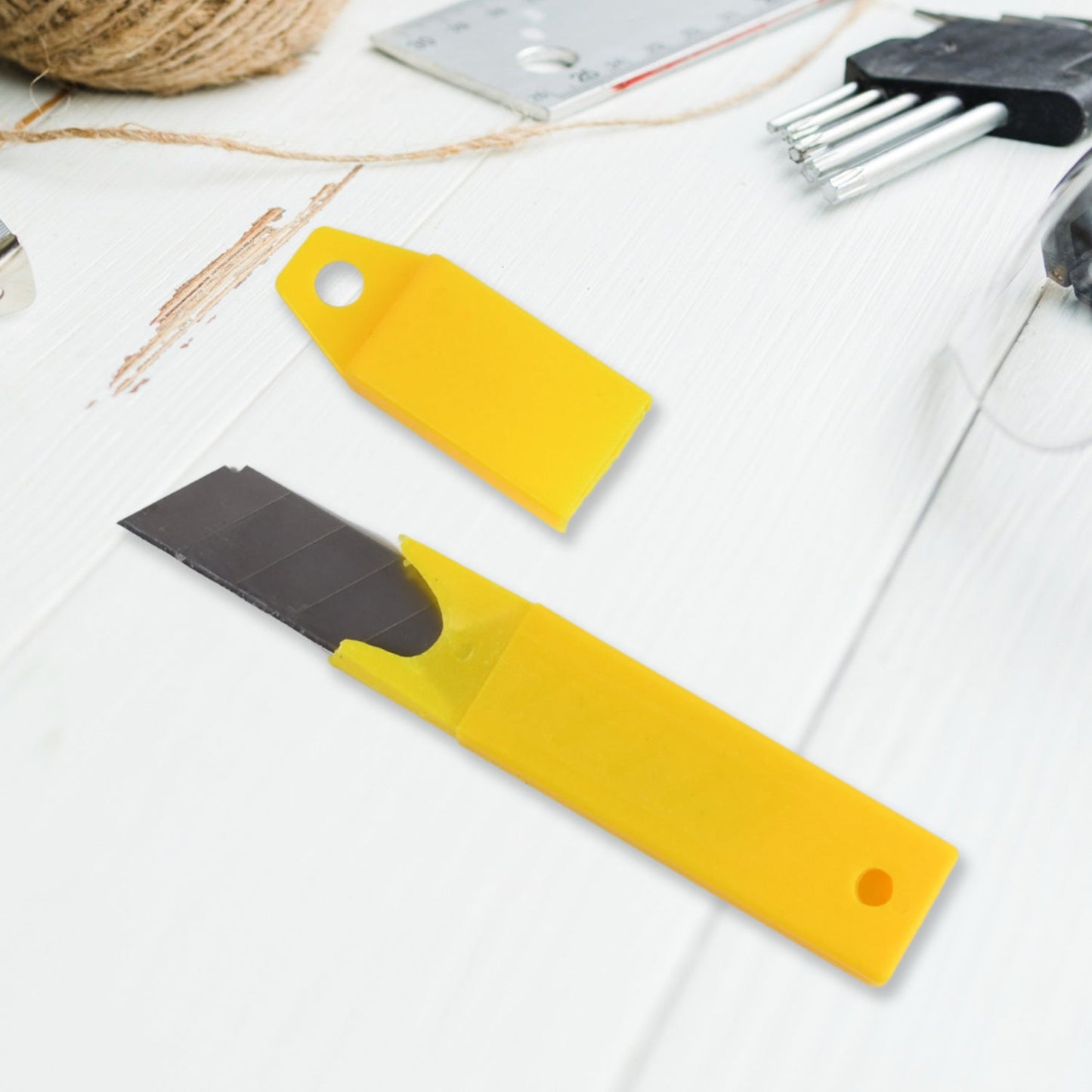 Compact cutter knife and screwdriver multi-tool with ergonomic grip