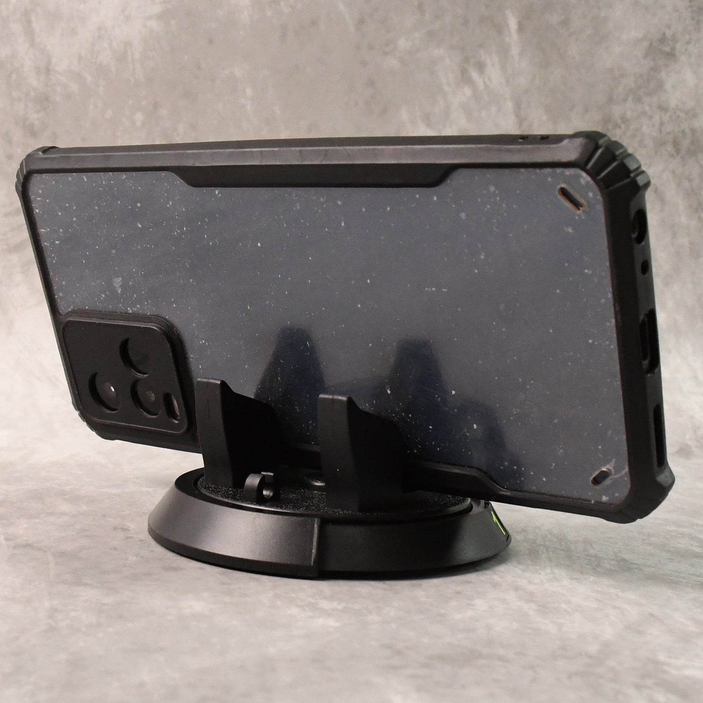 Car dashboard phone holder providing strong grip and stable support