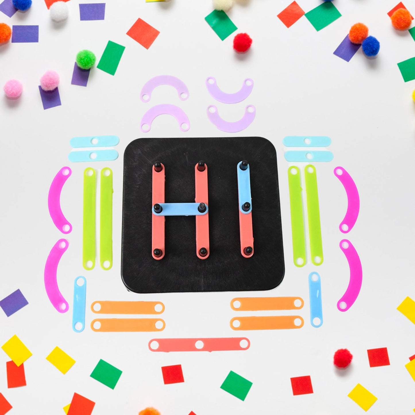 Assortment of colourful educational toy pieces for creative learning.