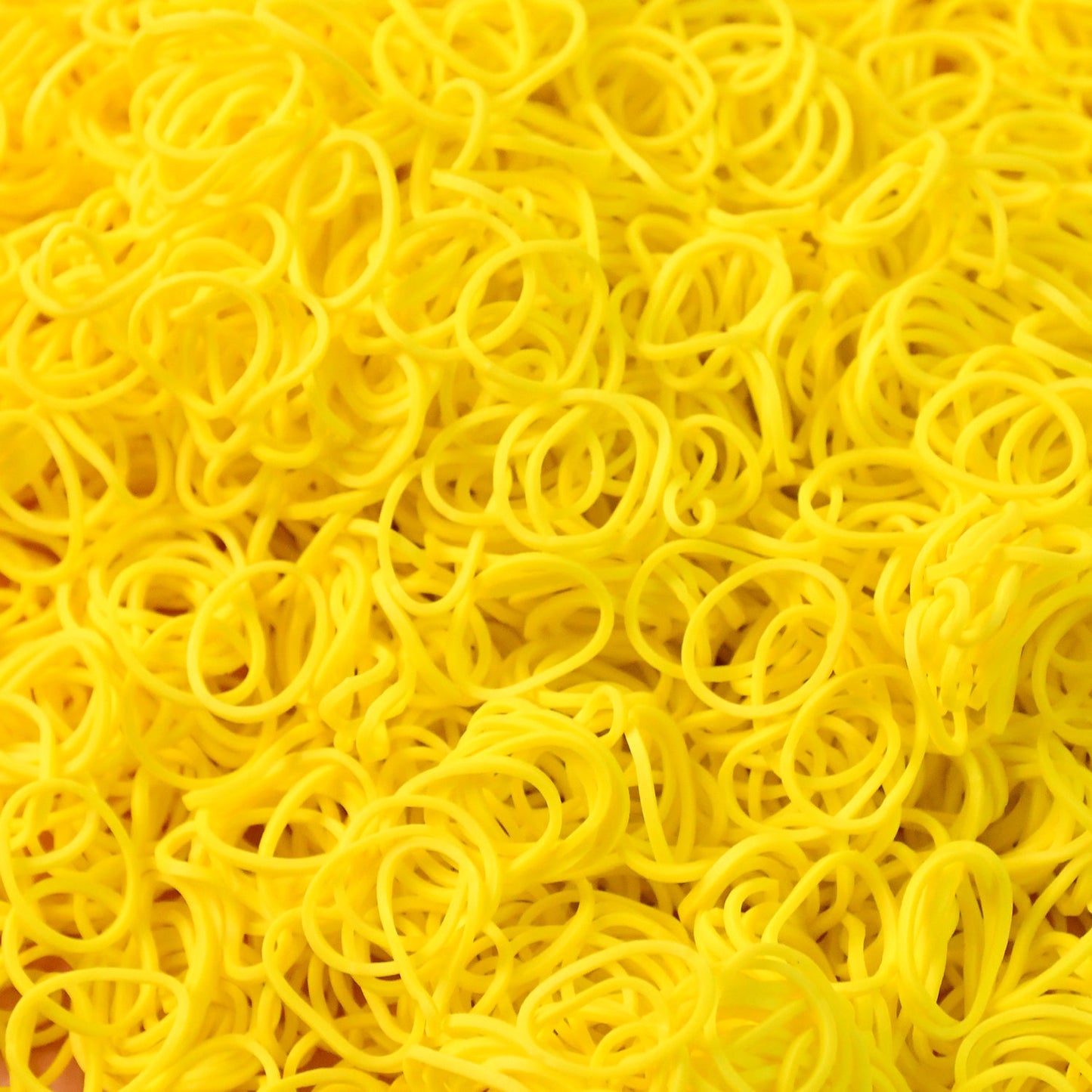Elastic rubber bands laid out on surface showcasing durability