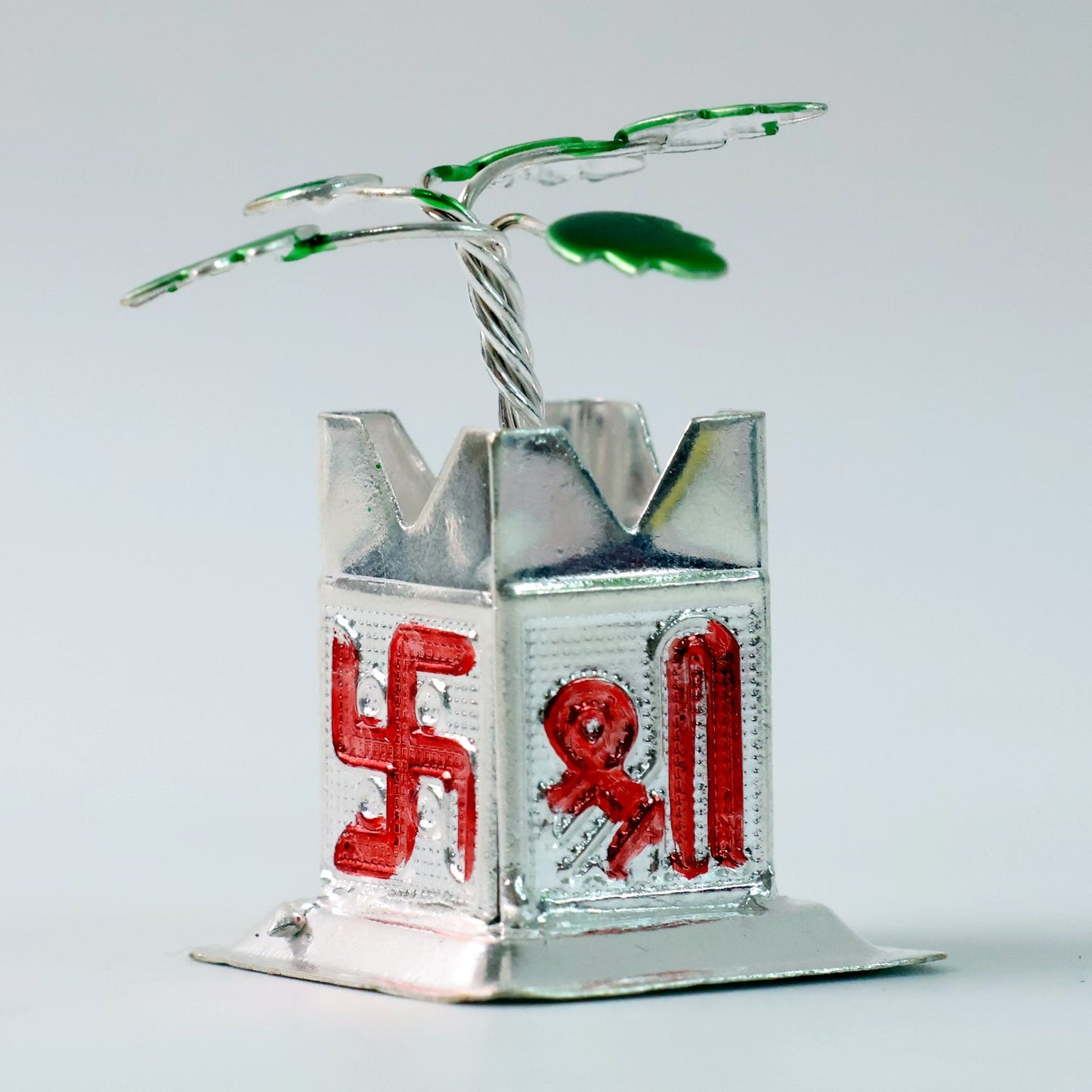 Side view of the auspicious Tulsi Idol on its square pedestal.