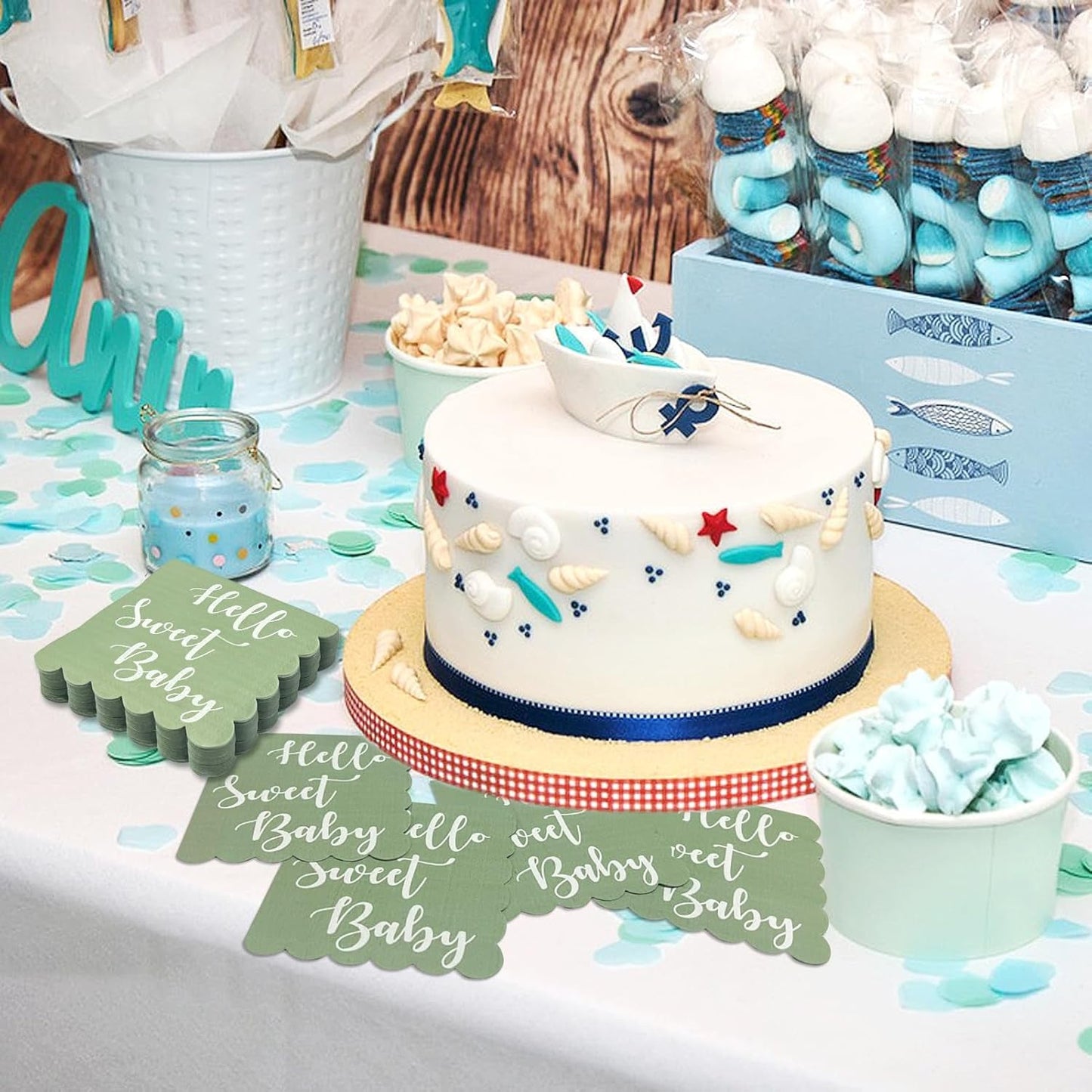 Mint green disposable paper napkins with decorative scalloped edges for baby shower