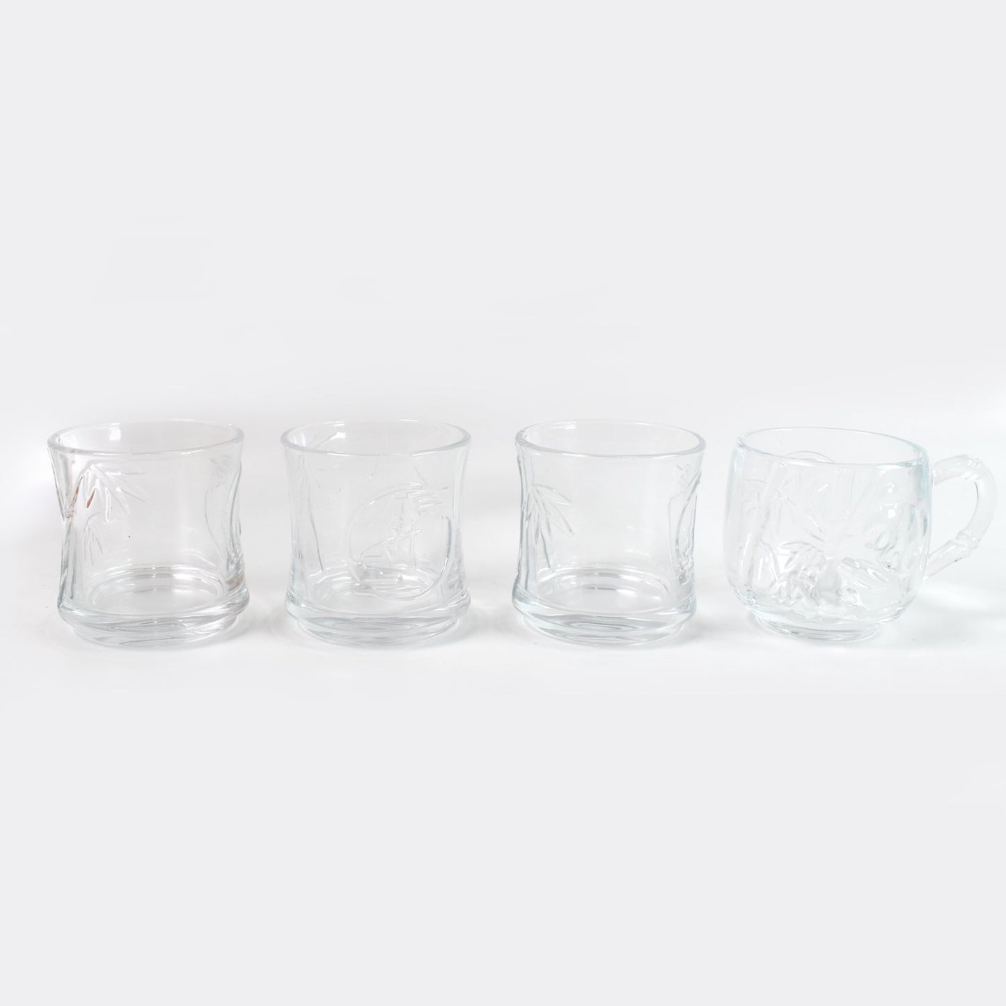 Stackable glass tumblers and mugs, part of a durable and practical drinkware collection.