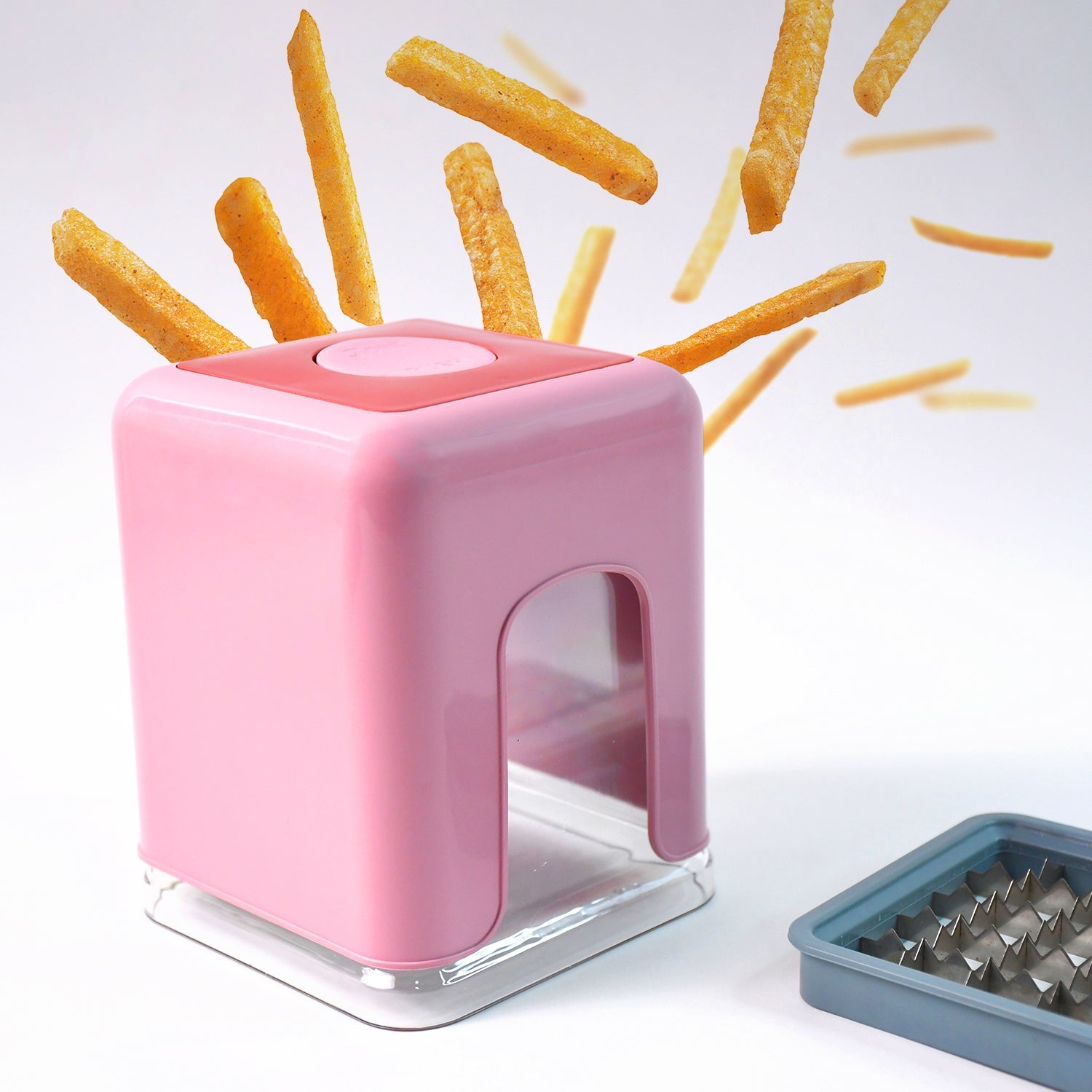 Potato chipser and vegetable chopper placed on kitchen countertop