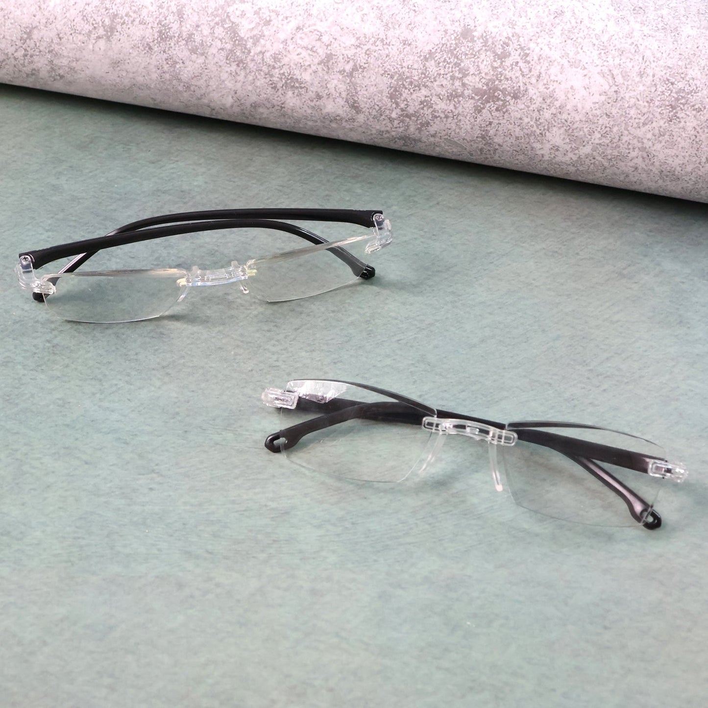 Protective case storing lightweight rimless reading glasses for travel