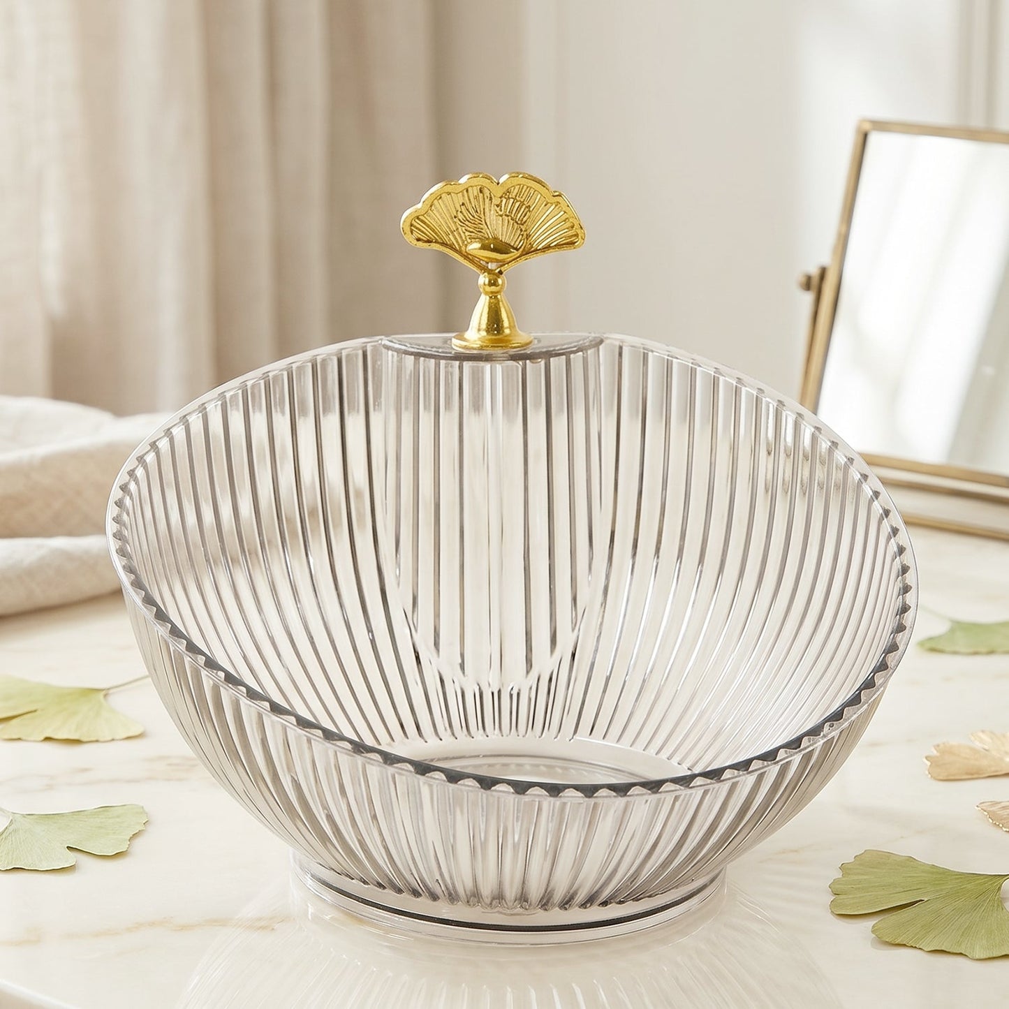 Decorative plastic fruit bowl with ribbed clear design and gold accent