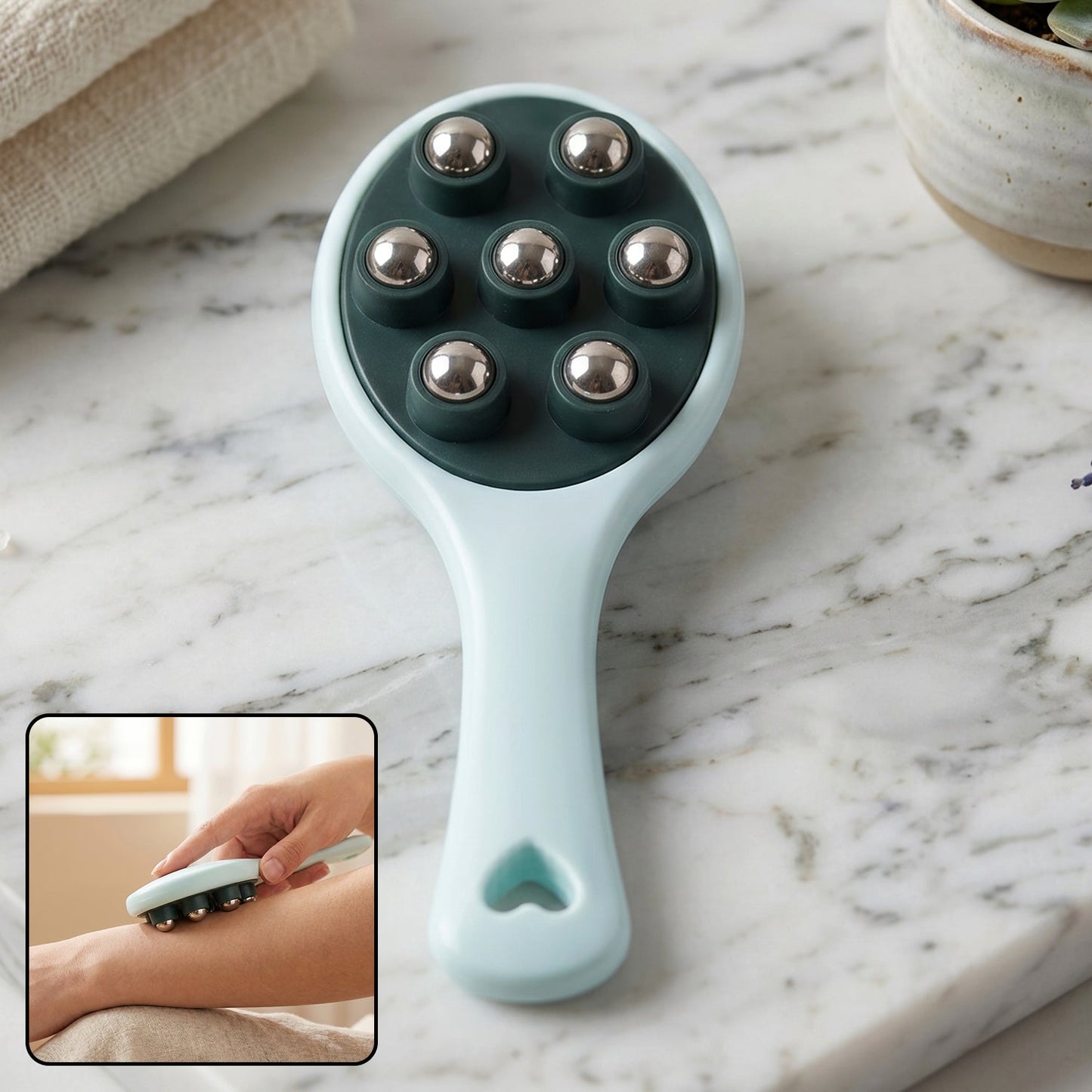 Close-up of the 7 steel ball massager head for targeted relaxation.