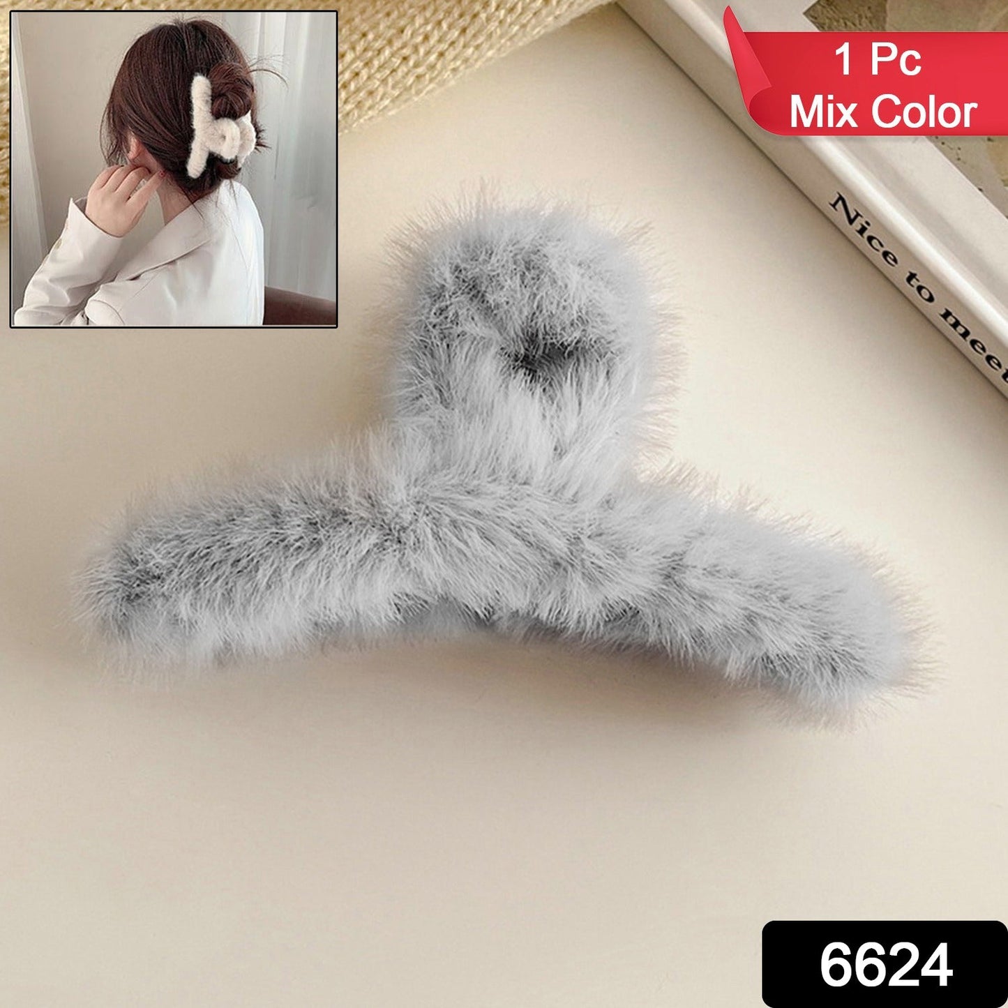 Close-up of a plush hair claw clip, showcasing its soft texture and secure grip.