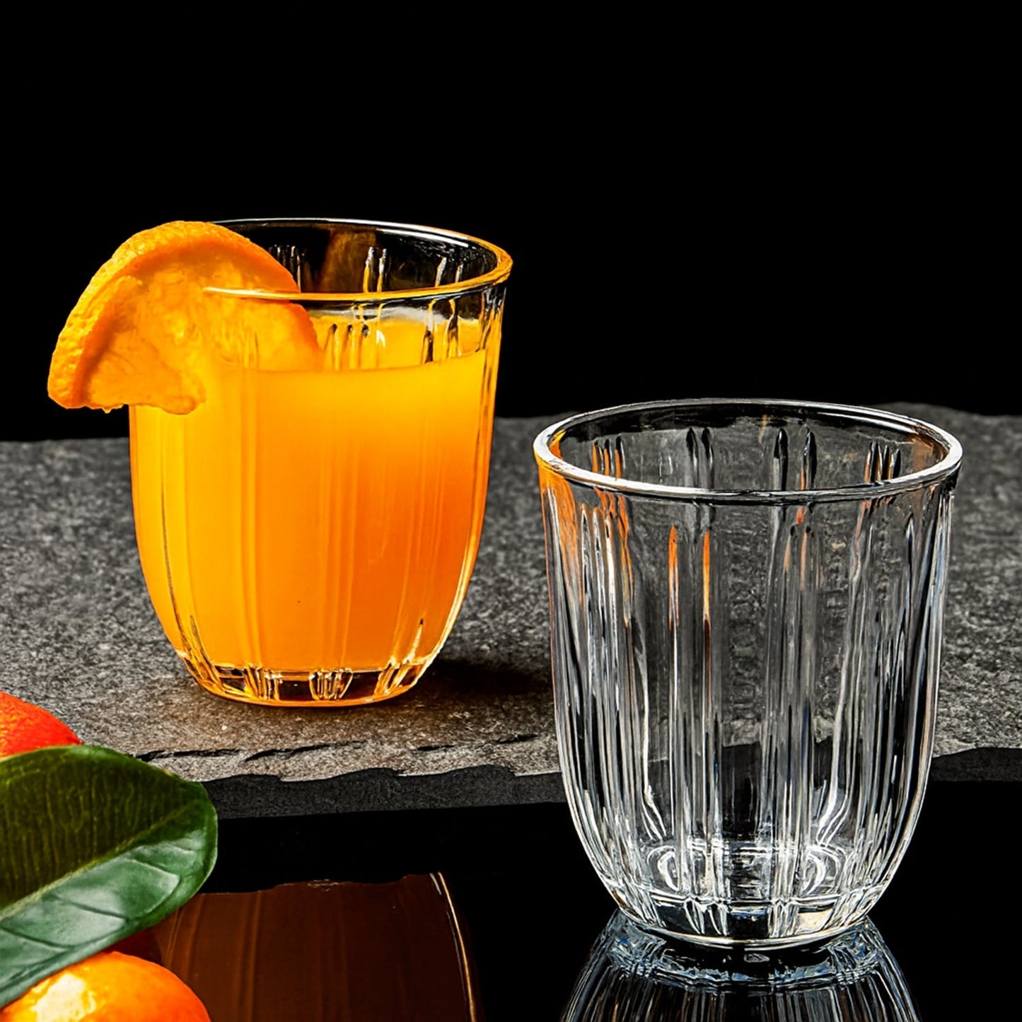 Elegant ribbed transparent glass tumblers for daily use