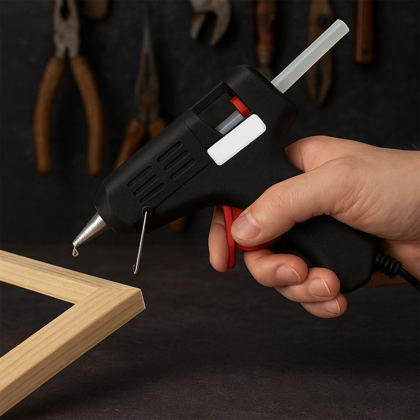 Close-up of glue gun ergonomic handle and textured grip for comfortable use