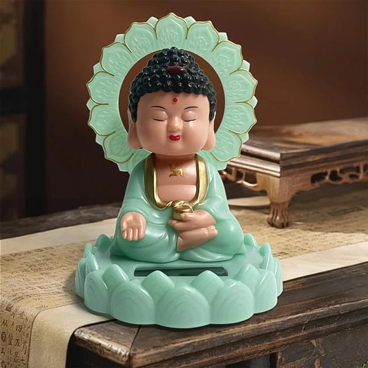 Solar powered Buddha statue

Moving head Buddha idol

Plastic dashboard Buddha

Sitting Buddha solar statue

Solar action figurine

Buddha statue for car

Dashboard decor Buddha

Meditation decor idol

Wobble head Buddha toy

Solar nodding Buddha