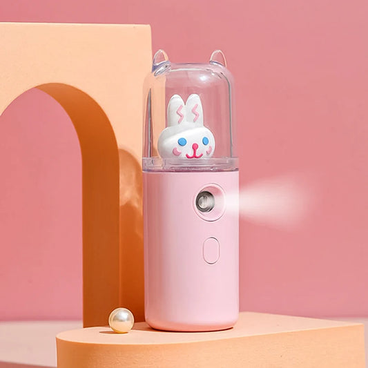 Mini facial steamer

Nano mist sprayer

Portable skin hydration steamer

USB rechargeable facial mist

Cute cartoon facial steamer

Travel-friendly face sprayer

Nano face mist device

Pocket size facial humidifier

Face hydration spray

Skincare gadget for dry skin

