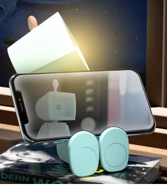 Spaceman night lamp, spaceman mobile stand, night light and mobile stand, spaceman desk lamp, space-themed night lamp, mobile phone stand lamp, 2-in-1 night lamp and stand, unique night light, space-inspired lamp, LED spaceman lamp, mobile holder lamp, kids room night lamp, decorative night lamp, multifunctional lamp stand.

