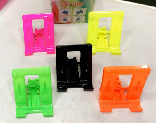 Universal mobile stand for smartphones
Adjustable plastic phone stand
Durable phone holder for video calls
Lightweight mobile stand for travel
Hands-free smartphone stand
Anti-slip mobile holder for desk
Best affordable mobile stand
Jio mobile stand for Android and iOS
Compact phone stand for home and office
