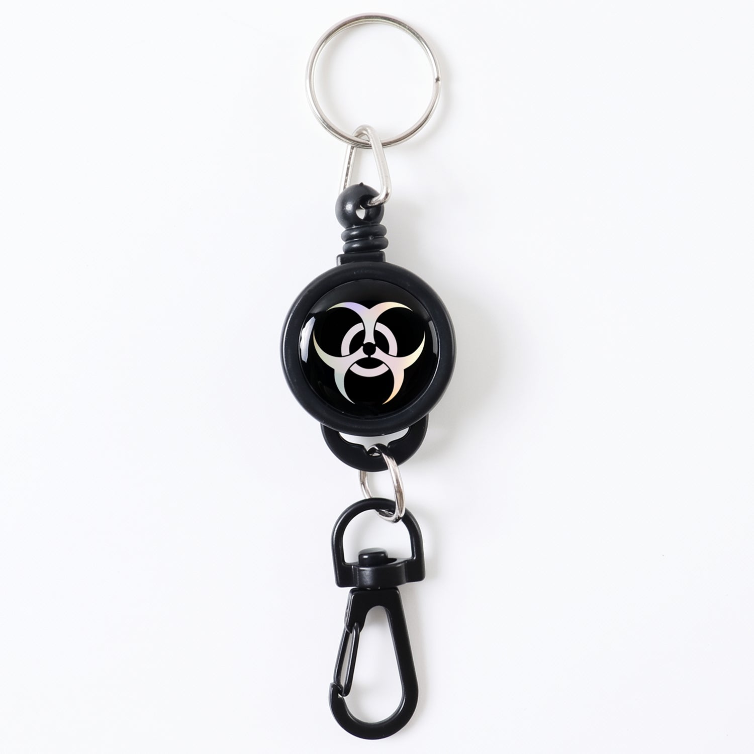 Durable retractable keychain securely clipped onto a fabric strap.