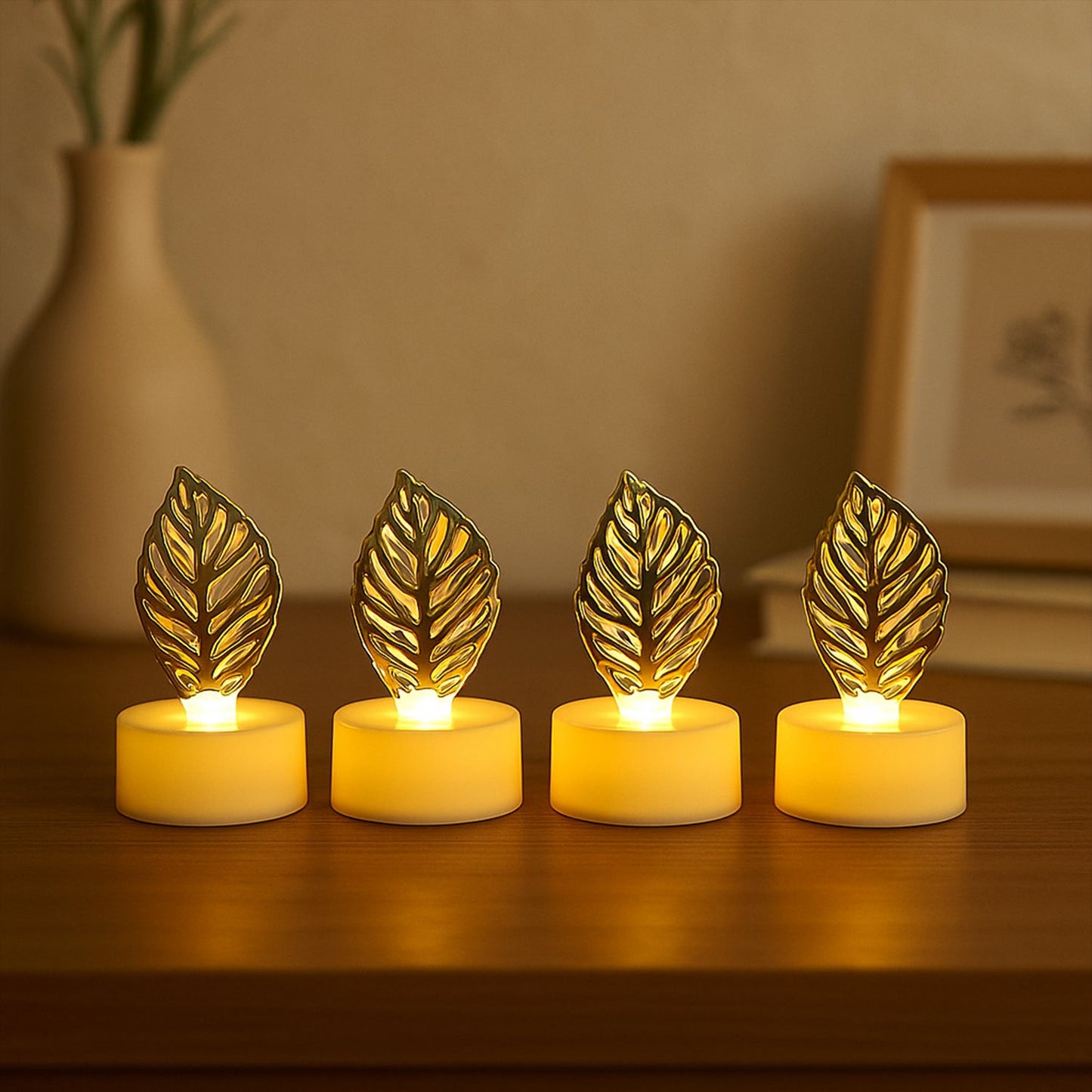 Close-up of a single golden leaf LED candle showcasing its textured design and warm glow.