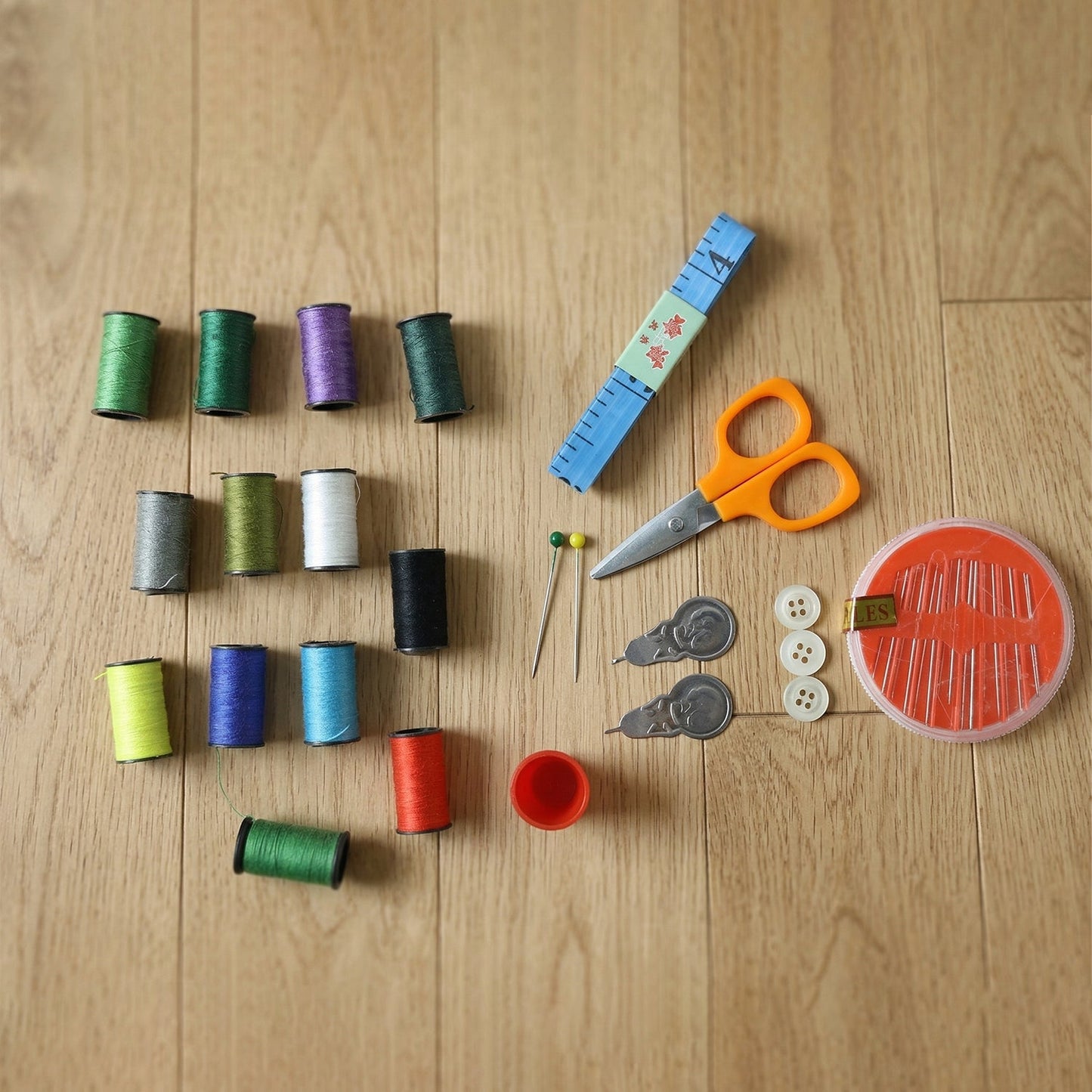 Purse-sized mini sewing kit, compact and easy to carry for quick fixes.