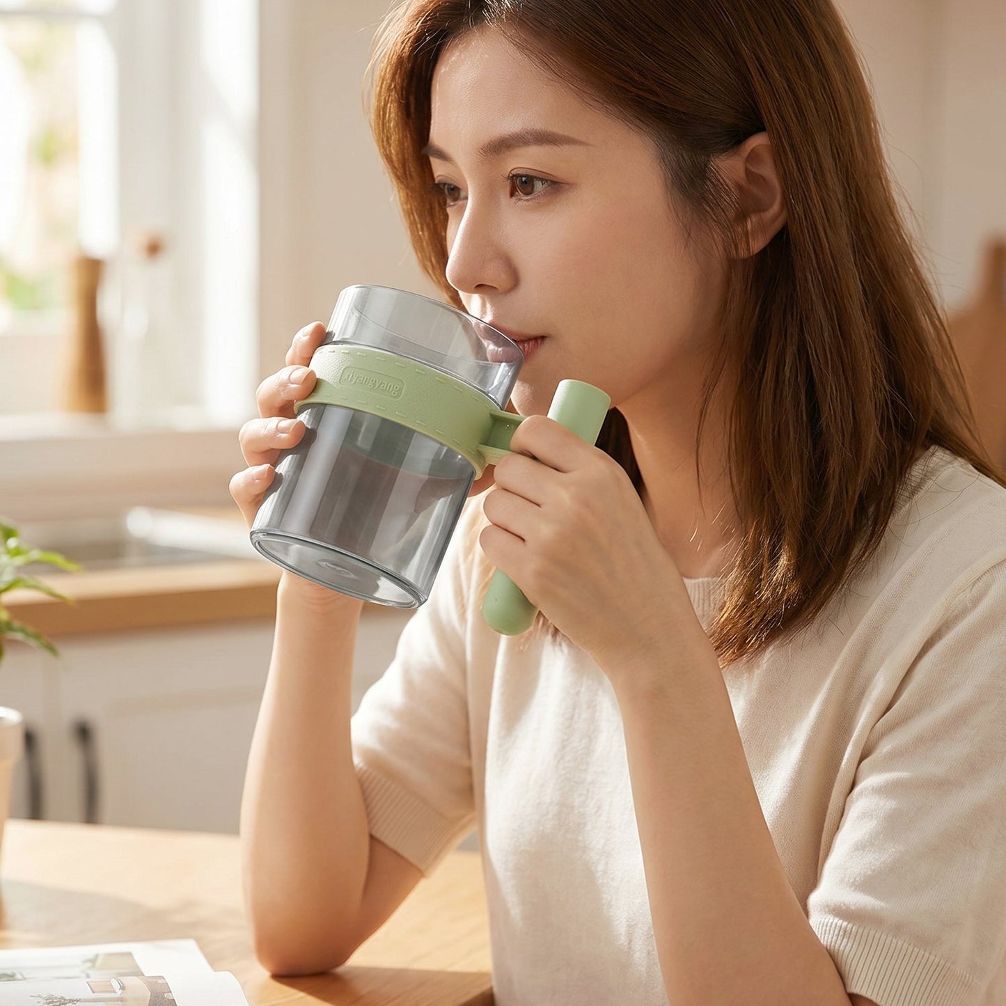 See through plastic cup with handle for tea, coffee and juice