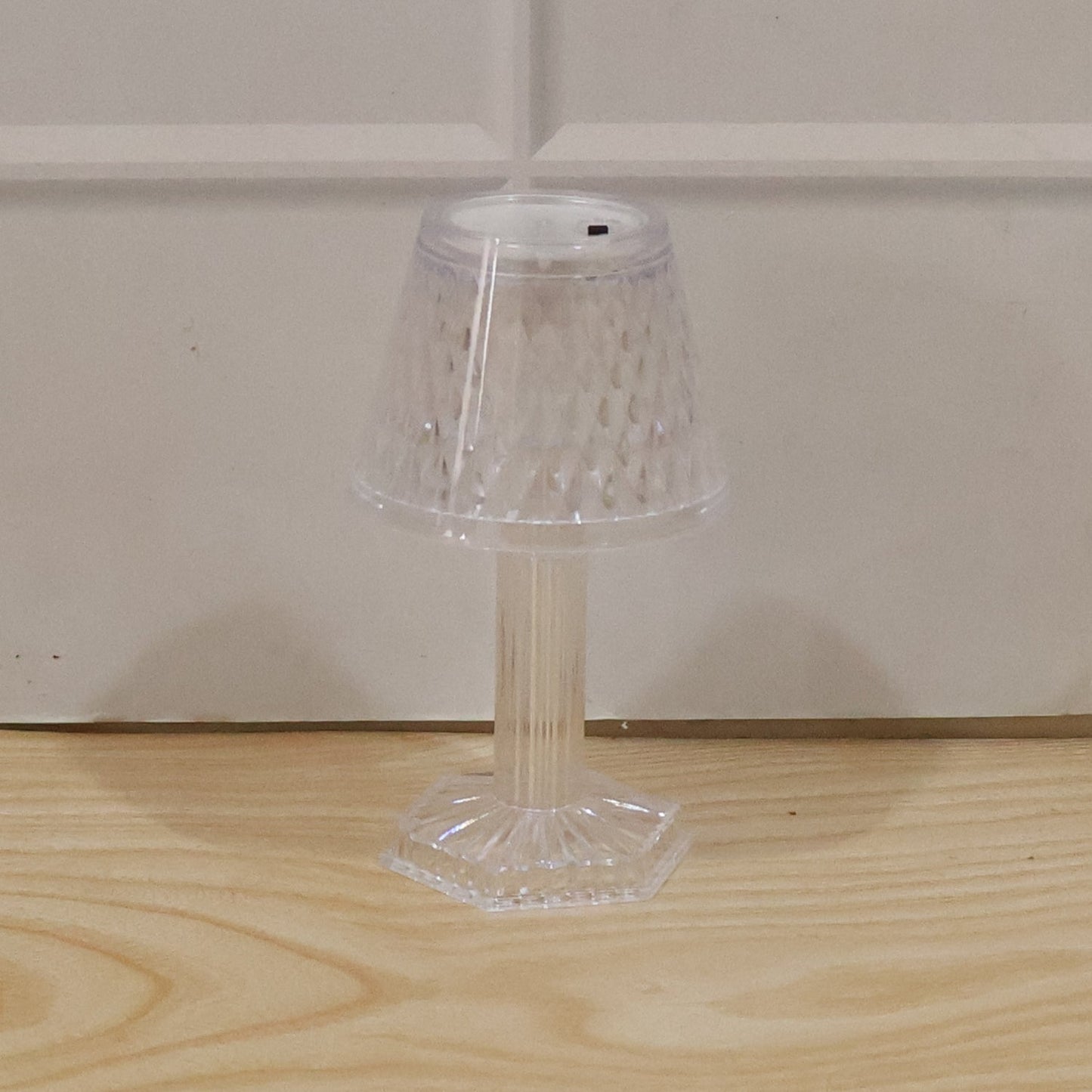 Decorative crystal lamp perfect for adding sparkling light to any corner.