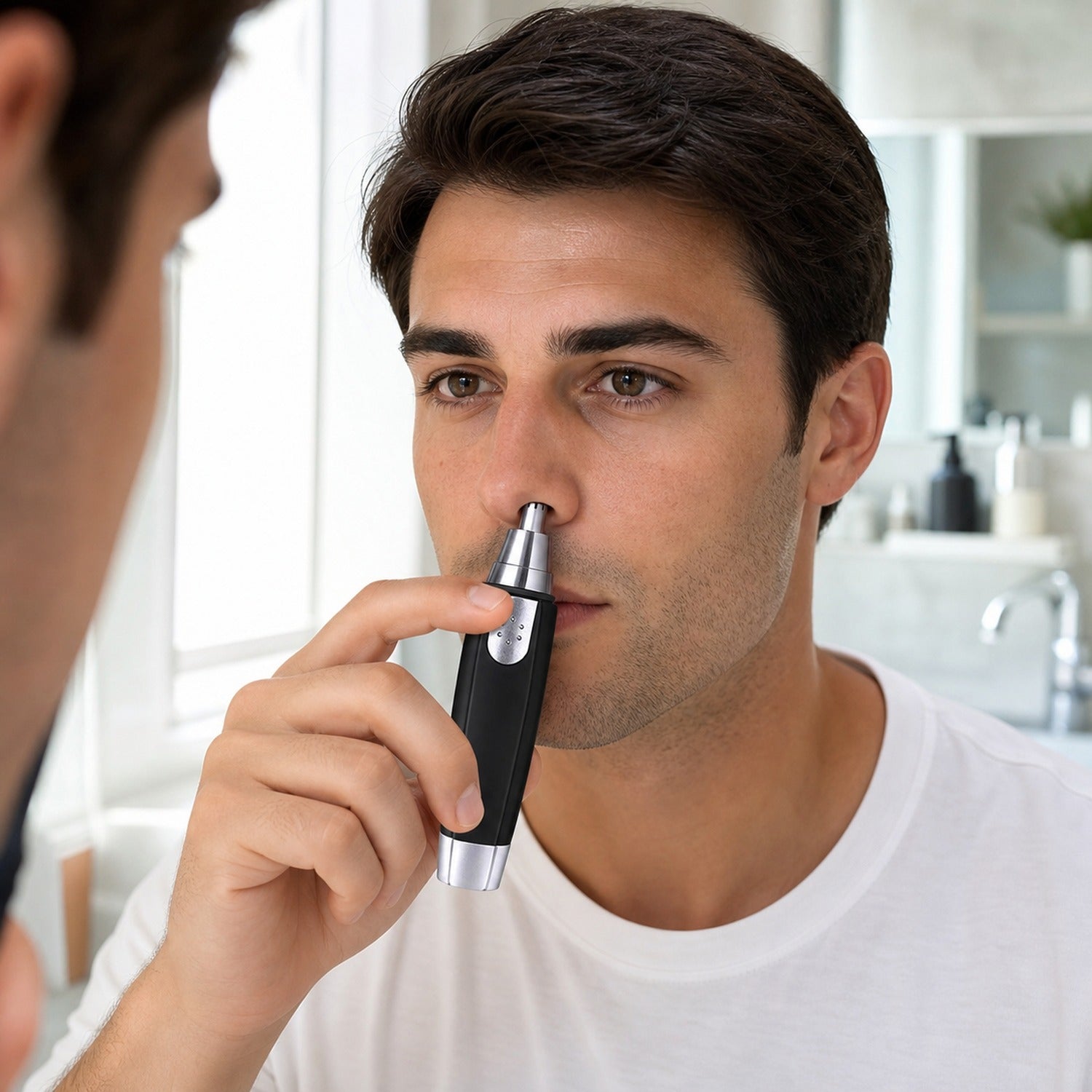 Side profile of the portable trimmer, highlighting its ergonomic and lightweight design.