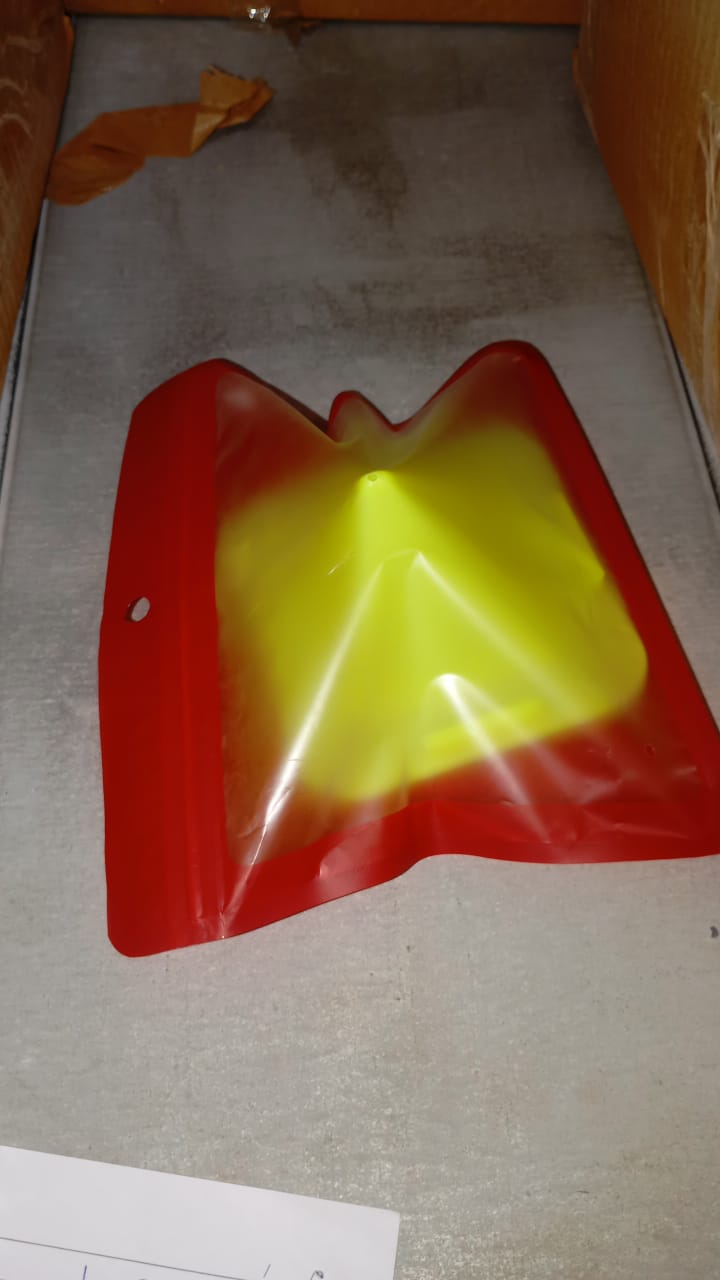 Compact pyramid mobile phone stand ideal for car dashboard use